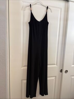 Black Wide-Leg Jumpsuit with gold accent on straps